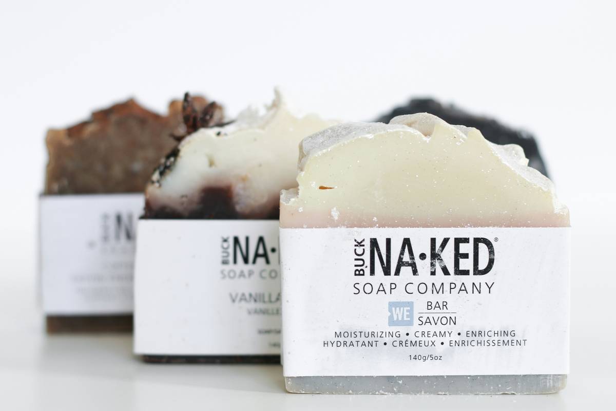 Diagram showing how bath oil soak bars create an occlusive layer on skin during bathing versus traditional products that strip lipids